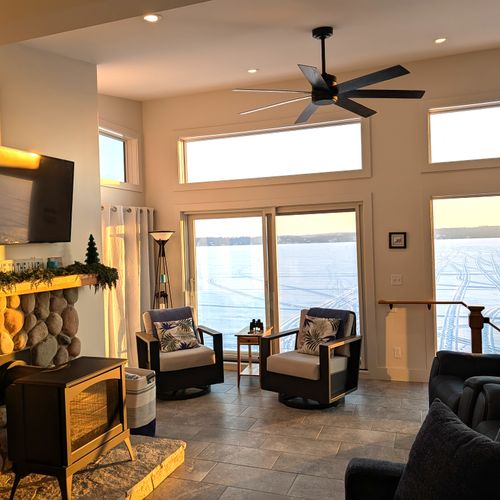OVERVIEW:  The home has an exquisite living room on the upper level (third floor) with a spectacular view of Crystal Lake!  PLEASE NOTE THAT THE FIREPLACE IS NOT AVAILABLE FOR GUEST USAGE.