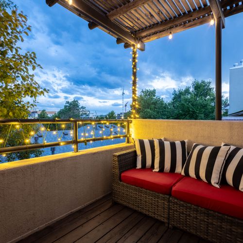 Enioy a private balcony off the primary suite.