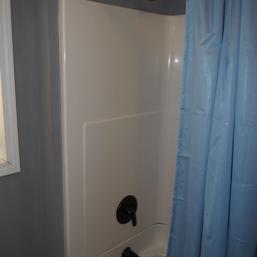 Bathroom #1 (main floor):  full en suite bathroom for bedroom #1.