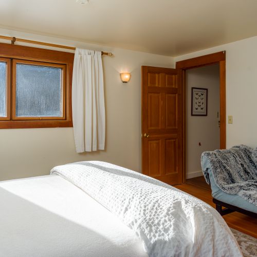 The small seat folds down to a futon for a small child.