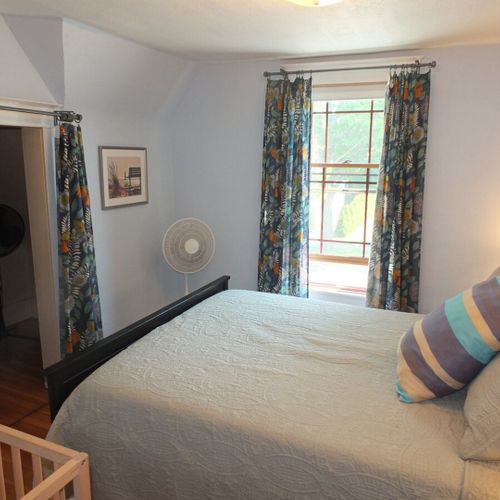 Bedroom #2 (second floor):  this bedroom features a queen-size bed, large closet, nightstands, lamps, and a baby crib! It is on the second floor.