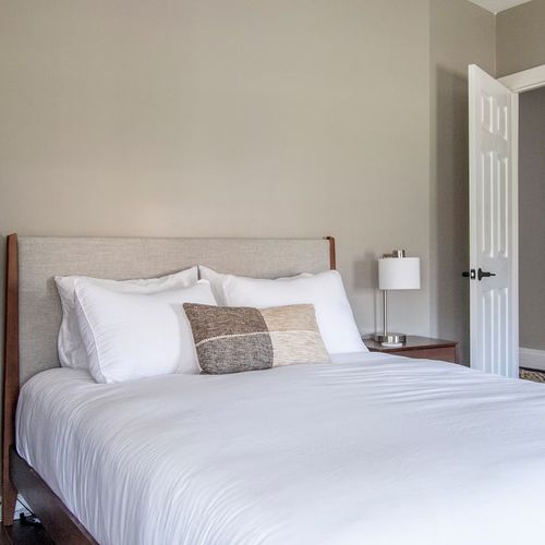 The large and light-filled primary bedroom