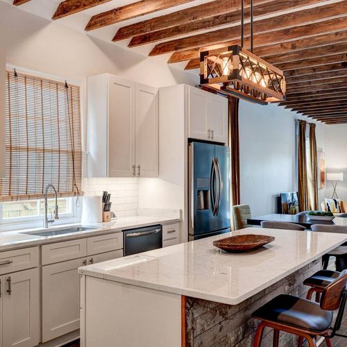 Fully stocked kitchen w/ ample counter space & storage for effortless meal prep.