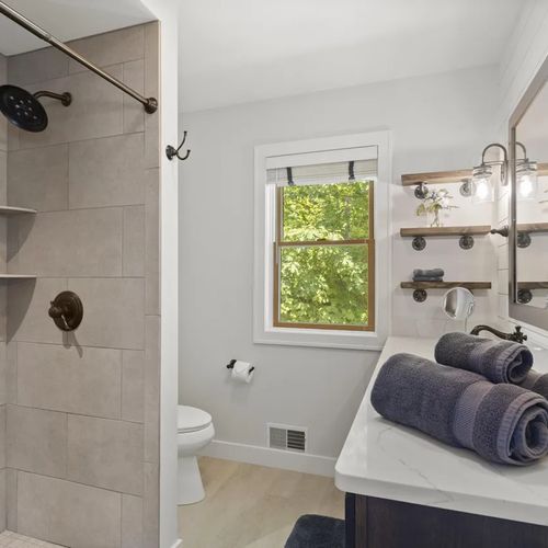 BATHROOM #2 (UPPER LEVEL):   This is the full private ensuite bathroom for the primary bedroom.  It includes a walk-in shower.