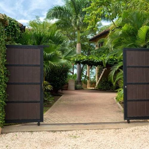 The house is completely walled off and has electric gate