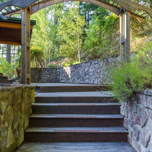 Lavendar, maple trees and birch trees line the gardens