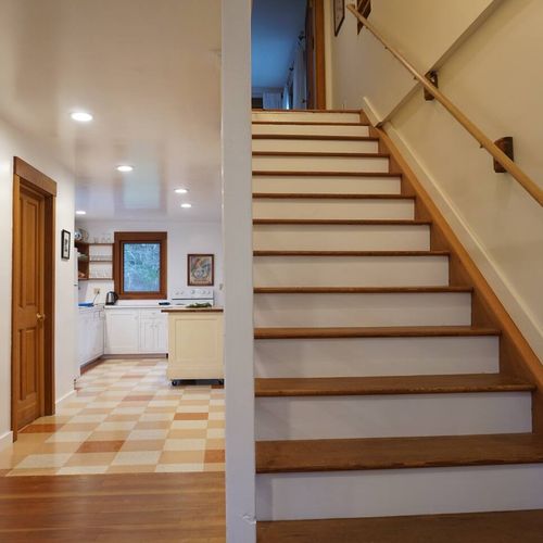 Stairs heading up to the second-floor bedrooms.