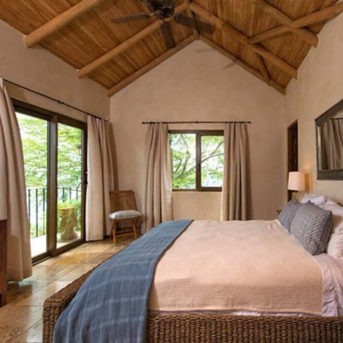 The king bed is a great place to recharge and relax