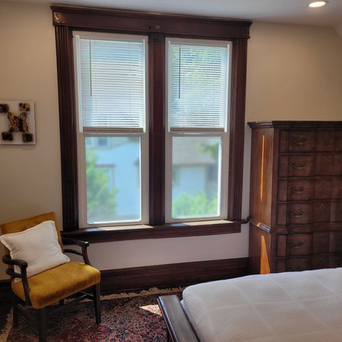 Bedroom #5 (second floor):  features a queen-size bed, dresser, 2 chairs, 2 lamps, and a closet.