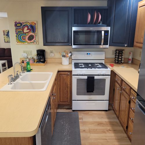 KITCHEN:  The home has a large and modern kitchen with all appliances (including a dishwasher) and a good supply of cooking and dining utensils.