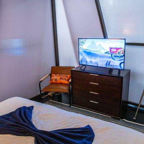 Kick back & stream your favorites on the flat-screen from the comfort of your bed.