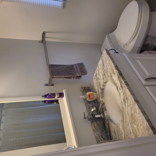 Bathroom #2:  full common bathroom on the main floor with a combination tub and shower.