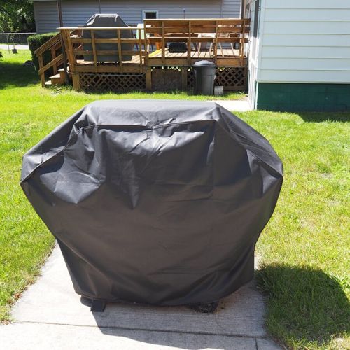 Exterior:  the propane grill that is shared by the 2 apartments.