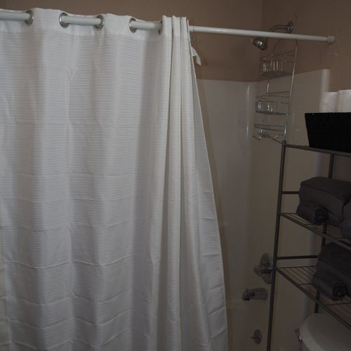 Bathroom #1 (main floor):  full bathroom with combination tub and shower on the main floor.