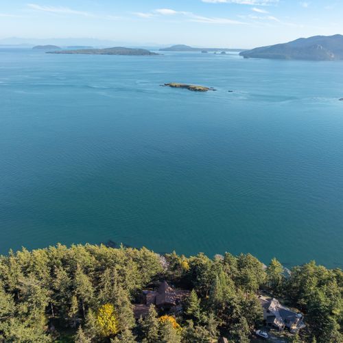 Located on a high bank overooking the Salish Sea to the east.  Sunrises are amazing.