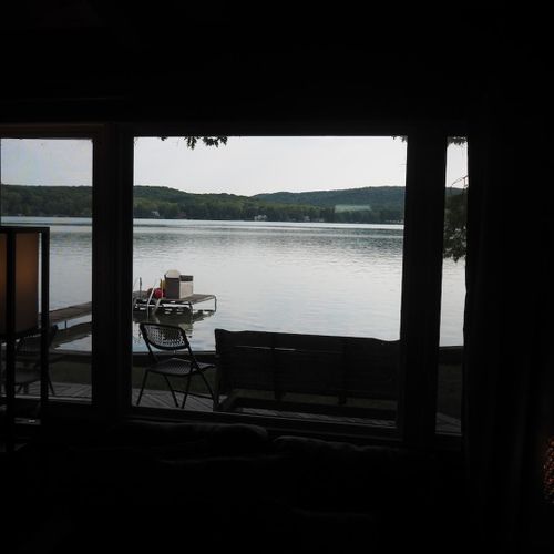 Living room:  the view of little glen lake at twilight from the living room window.