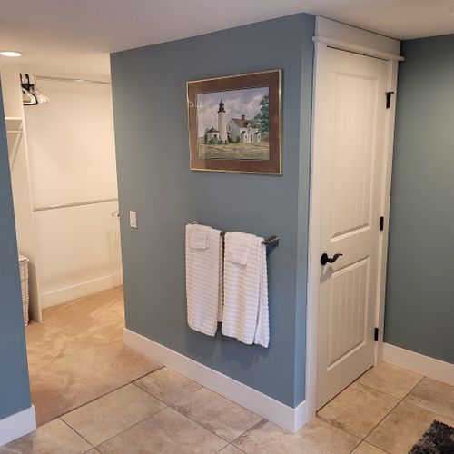Bathroom #2 (larger house, main floor):  this is the private en suite full bathroom for bedroom #1. (the area on the left is the large walk-in closet and the door goes to the space where the toilet is located. The shower is to the right of the door. )