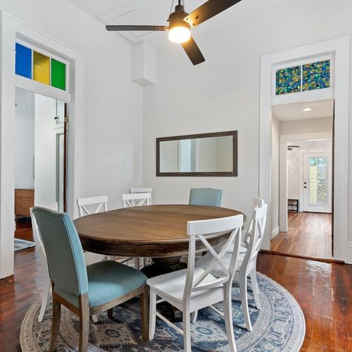 Dining area w/ a round table that seats eight — ideal for shared meals & good conversation.