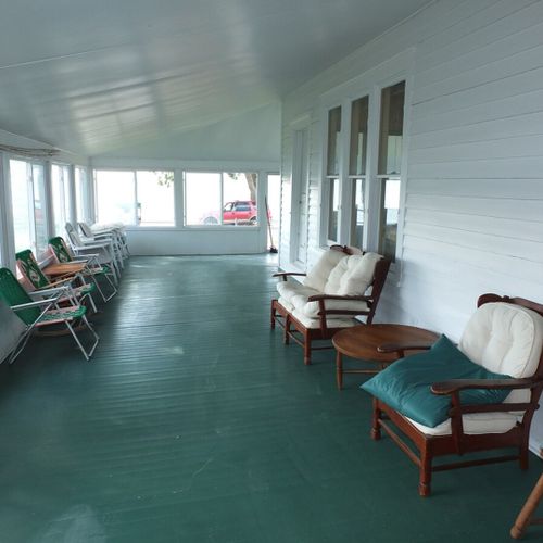 Porch:  the cottage has a huge wrap-around porch that is fully enclosed and has great views of crystal lake!