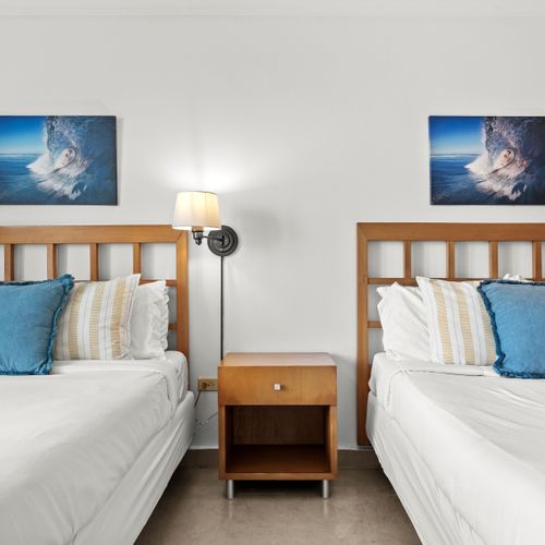 Thoughtfully arranged studio offering ample sleeping space and a refreshing connection to the outdoors.