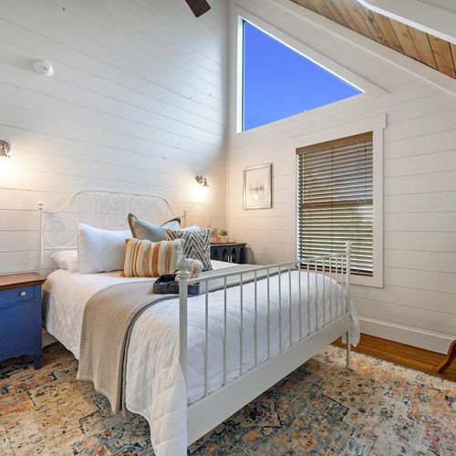 A Queen bedroom found on the second floor.