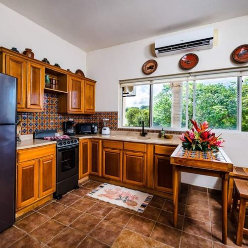 The warm and colorful kitchen will make you feel cozy!