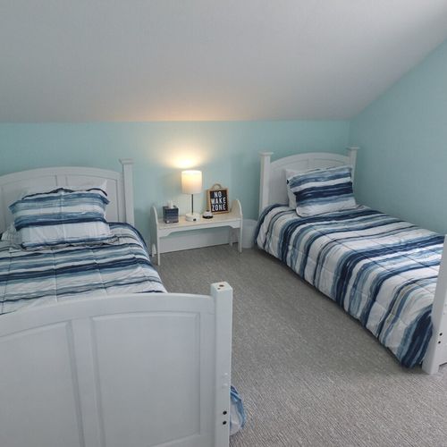 Upstairs living room:  another angle, showing the cute matching twin-size beds.