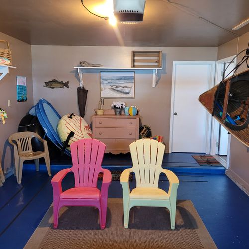 GARAGE (FIRST FLOOR):  The garage is not available for cars, but there is a good supply of outdoor gear that is available for guest usage.  Note that the canoe that is hanging on the wall is not available for guest usage.  It is for decoration only.