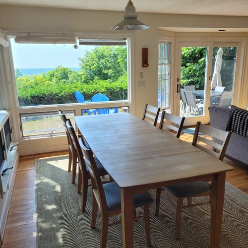 Dining area:  the home has a lovely dining area with great views of lake michigan and seating for up to 10 adults.