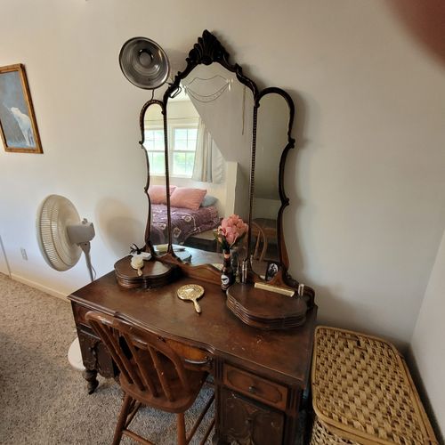 Bedroom #1 ( second floor):  large master bedroom with a queen-size bed, closet, vanity, ceiling fan, pedestal fan, and nightstand.