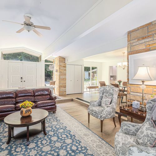 LIVING ROOM:  The beautiful formal living room that you come into when entering the home.