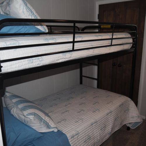 Bedroom #5 (second floor):  has two twin-on-twin bunk beds, thus sleeping four people.