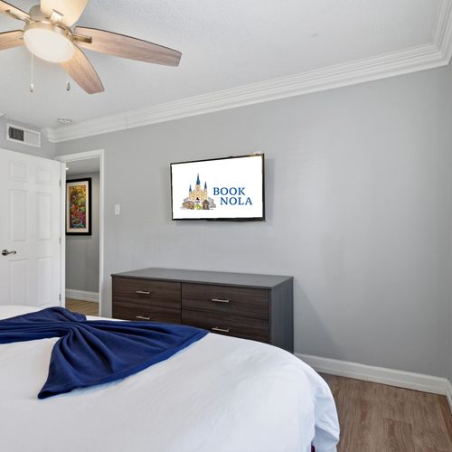 Simple, serene sleeping space w/ clean bedding & easy comfort.