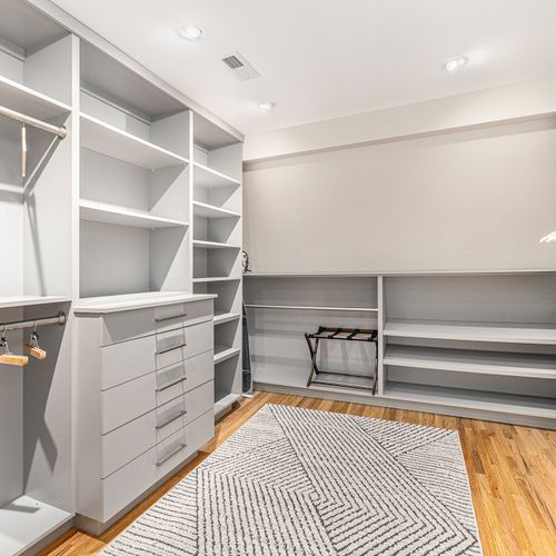Spacious master closet with ample storage and elegant design