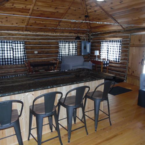 Kitchen:  a picture of the kitchen, living room, and dining room