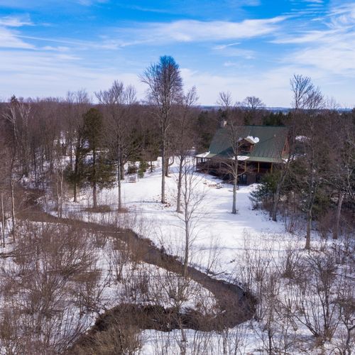 Exterior:  aerial photo highlighting the huge backyard and first creek as it winds behind the backyard.