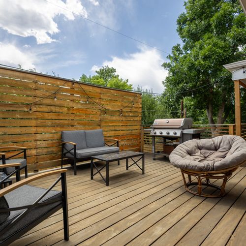Fire up the grill and chill in this breezy outdoor retreat.