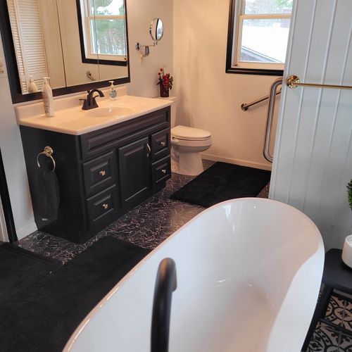 Bathroom #2 (second floor):  large and gorgeous bathroom with a soaking tub, walk-in shower, ceiling fan, mirror, vanity, sink, and a toilet with a bidet.