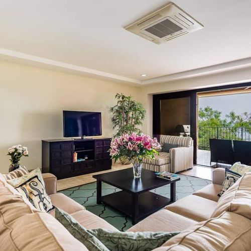 Relax on the couch to the sounds of the rolling waves.