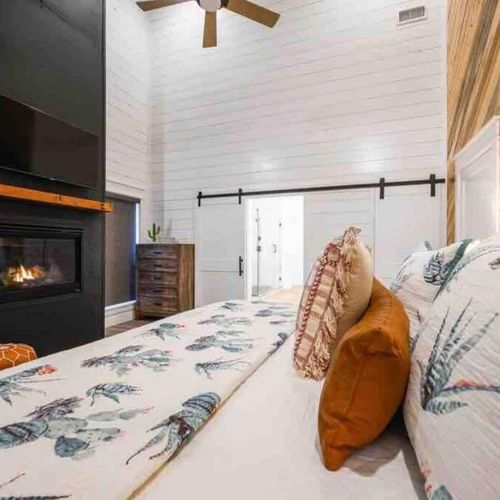 The only Master Suite on the main level. Equipped with a fireplace and King bed.