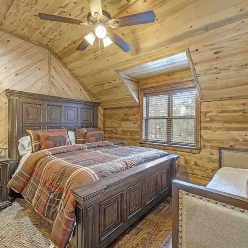 Upstairs Master Suite 5, has a day bed with trundle to accommodate more guests.