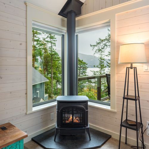 Where comfort meets scenery. Enjoy your morning coffee by the fire with a backdrop that feels like your own secluded sanctuary.