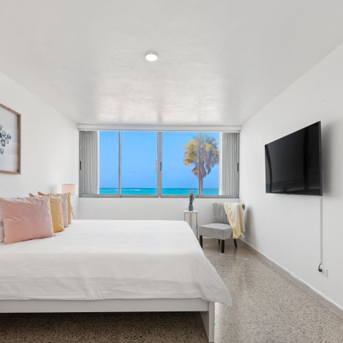 Spacious bedroom with a minimalist design.