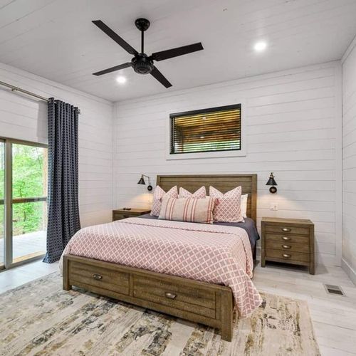 The sliding doors give guests of this room access to the outdoor patio.