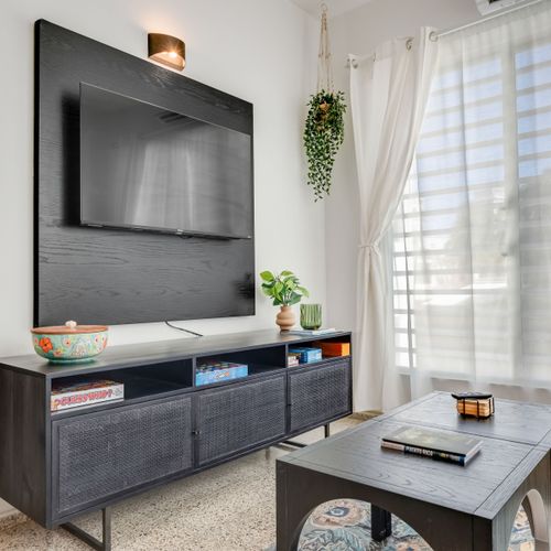 Relax in style in this inviting living room, perfect for unwinding.