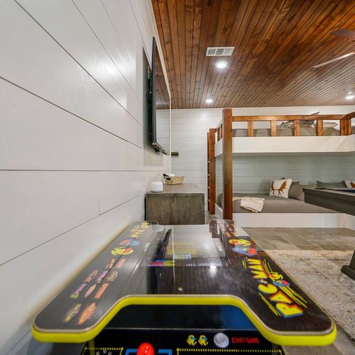 Arcade consoles are found in the game/bunk room.