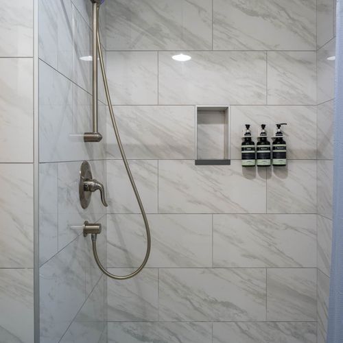 Fresh towels and  Ginger Lily shower amenities