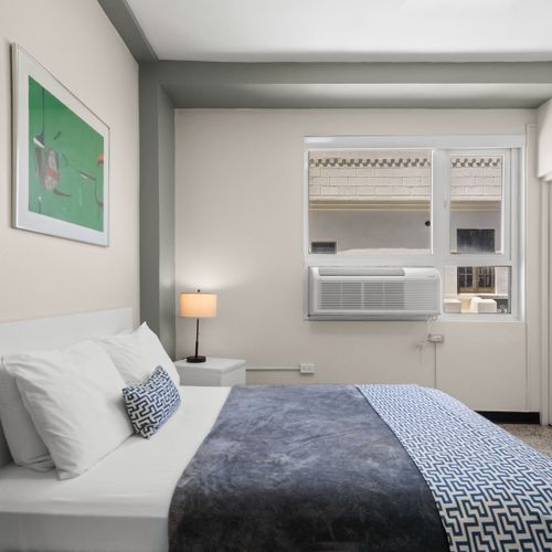 Experience a peaceful retreat in this cozy room, designed for restful sleep.