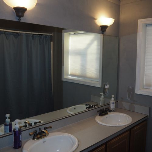 Bathroom #1 (main floor):  full en suite bathroom for bedroom #1.
