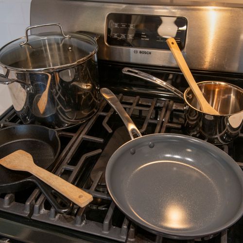 Enjoy a modern kitchen with quartz countertops, stainless appliances, and everything needed for cooking